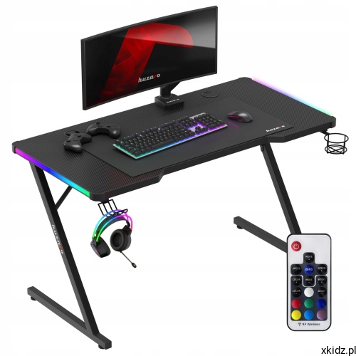 Huzaro HERO 2.5 RGB to biurko gamingowe z efektownym oświetleniem RGB LED sterowanym pilotem, które łączy praktyczne rozwiązania z gamingowym designem.