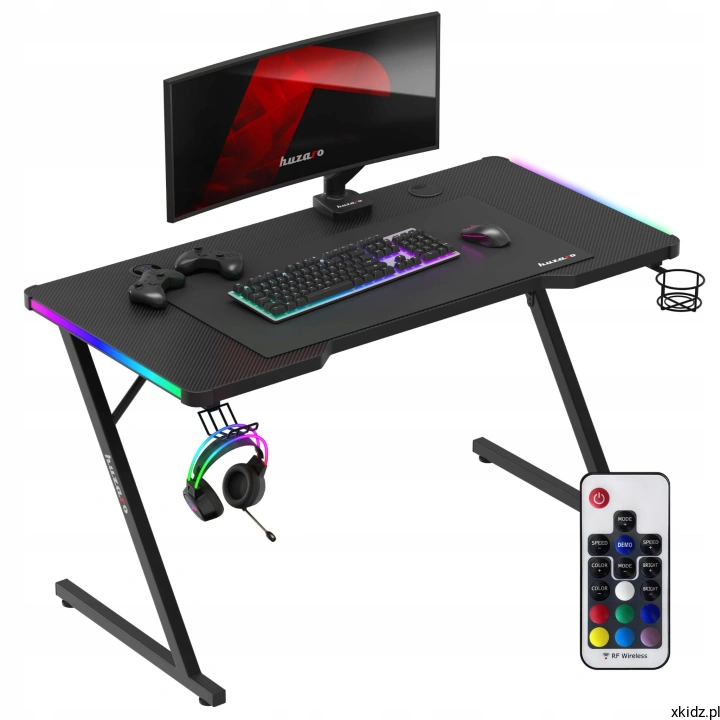 Huzaro HERO 2.5 RGB to biurko gamingowe z efektownym oświetleniem RGB LED sterowanym pilotem, które łączy praktyczne rozwiązania z gamingowym designem.